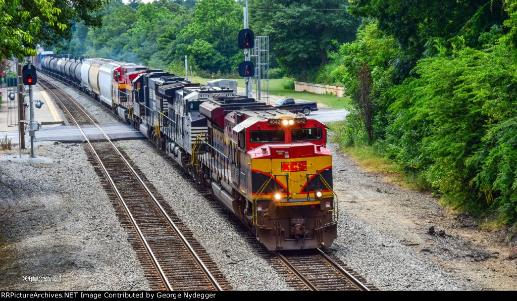 KCS 4042 leads a mixed freight train